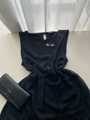 Women's black blouse M-L like new
