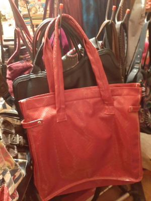 Red shoulder bag used with crocodile pattern plastic design