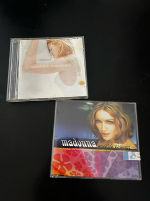 Madonna CD άριστη κατάσταση με τίτλους Something to Remember και Beautiful Stranger