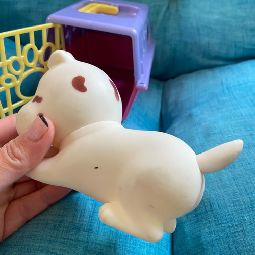 Simba collectible dog figure with carrying cage used
