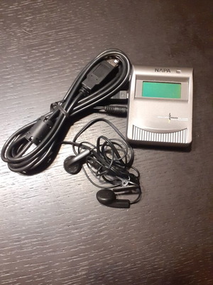 MP3 player used with headphones and USB data cable