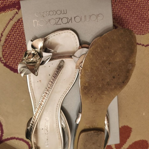 Gianna Kazakou women's flat sandals like new with adjustable strap and decorative flowers