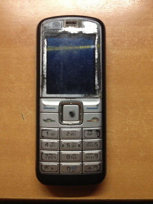 Nokia 6070 RM-166 silver used for parts or repair