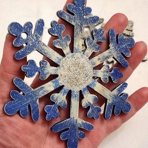 Wooden snowflake elements used, pack of 2, blue with silver glitter