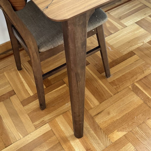 Large dining table with two chairs