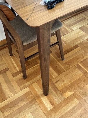 Large dining table with two chairs