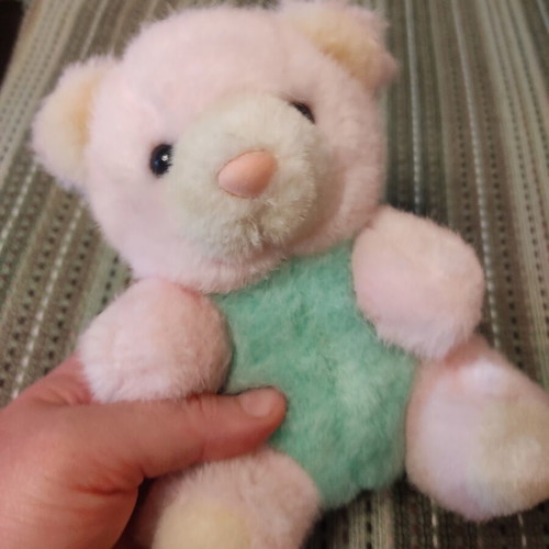 Teddy bear used with bell, pastel colors, 90s decade