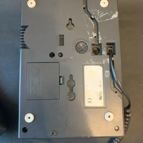 Wired phone used, gray, with non-working screen