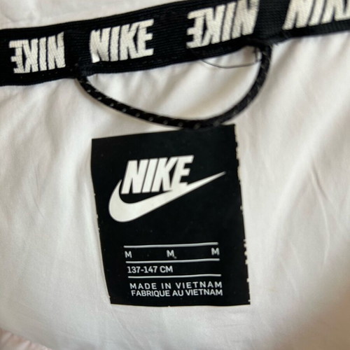 Nike jacket used for girls size Medium with stain on hood