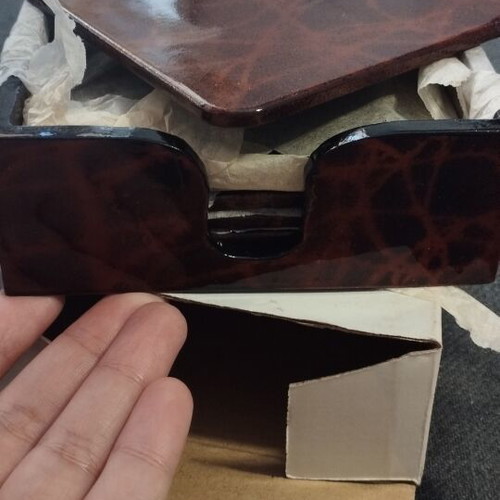 Vintage coaster set with tortoiseshell effect and case