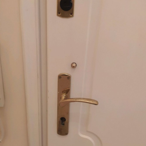 Lacquered entrance door used, terracotta exterior, white interior