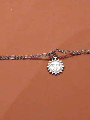 Silver bracelet with dangling charms