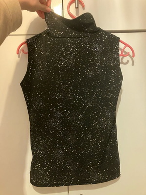 Black sleeveless turtleneck top with silver glitter like new