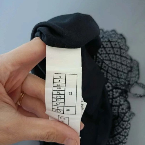 Orsay top with ruffles size 32 like new, gray geometric pattern