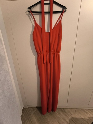 Red one-piece jumpsuit like new in cool fabric
