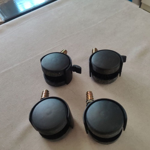 Chair wheels set of four used, two with locks, adaptors included