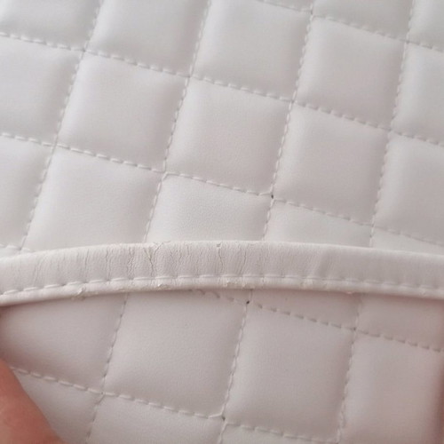 Tablet bag with slight wear on strap