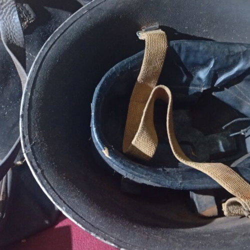 Military bag and helmet used, officer rank