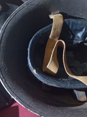 Military bag and helmet used, officer rank