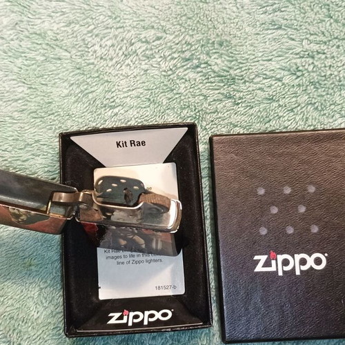 Zippo used collectible lighter with Rae design