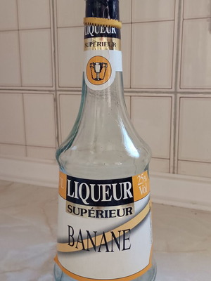 Vintage banana liqueur bottle used, empty for collection