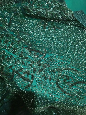 Emerald green fabric with sequins and beads like new
