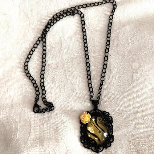 Vintage style pendant necklace with rose and butterfly details, like new