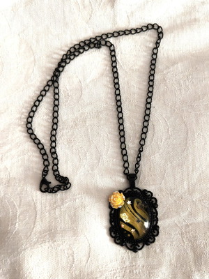 Vintage style pendant necklace with rose and butterfly details, like new