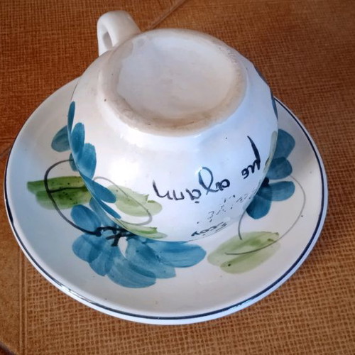 Ceramic cup and saucer set used, tea size