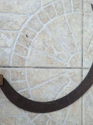 Vintage traditional sickle with wooden handle