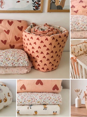 La Millou crib protector set with pillows and two sheets like new