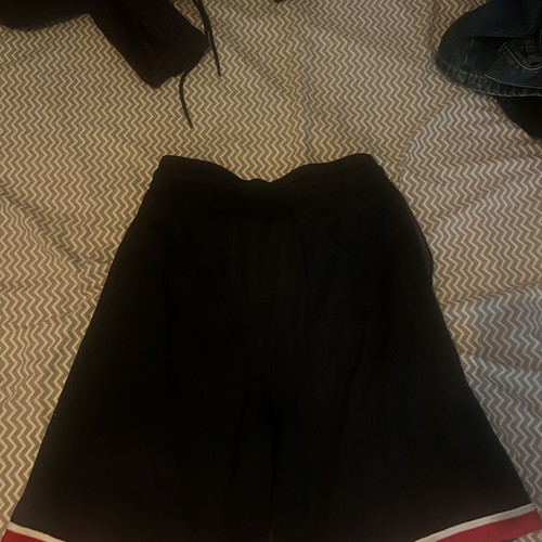 Nike Dri Fit NBA shorts, red and black
