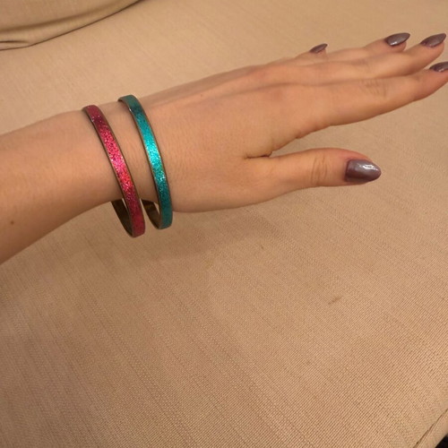 Set of metallic bracelets like new, pink and turquoise