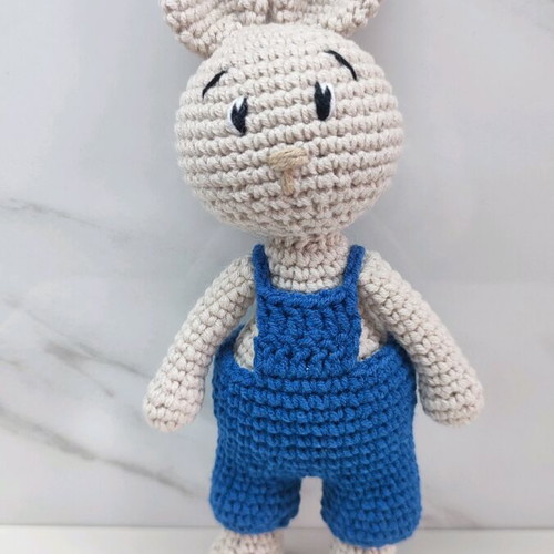 Amigurumi knitted bunny new with dark blue overalls