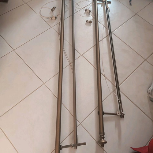 Bronze curtain rods like new with manual mechanism and rail