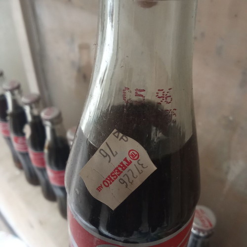 Collectible Coca Cola bottle full from 1990s decade new, one piece