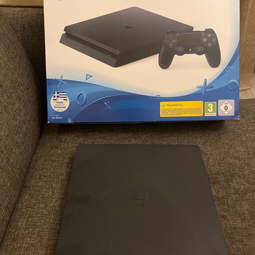 PS4 Slim 500GB console like new with controller and Metal Gear Solid