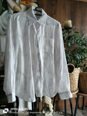 White transparent women's shirt with embossed details, new, size L