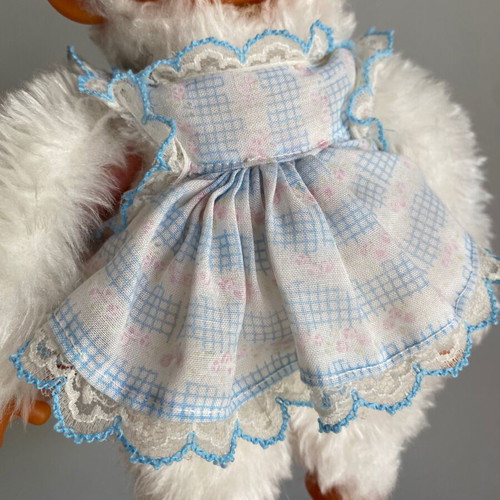 El Greco vintage white monkey plush toy in dress