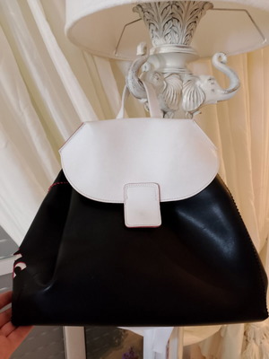 FRNC backpack like new, leather, black and white