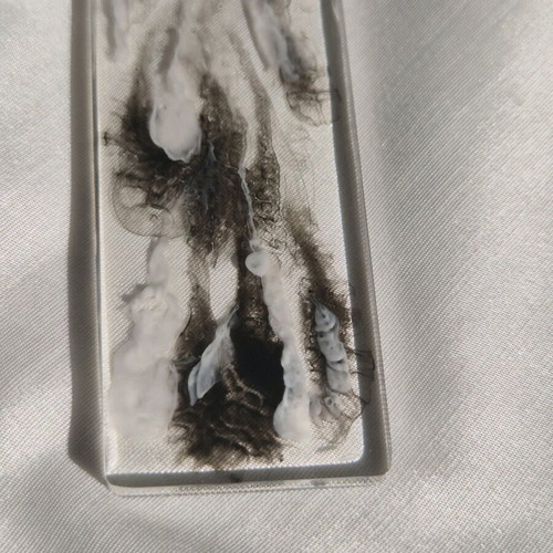 Handmade bookmark from white and black resin like new