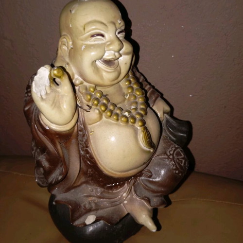 Budai statue used, symbol of happiness and prosperity