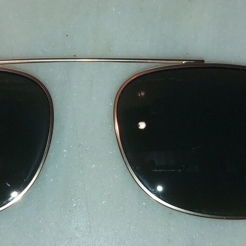 Clip On Sunglasses like new, gold color, no name