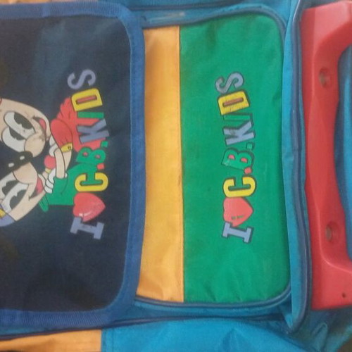 Vintage school bag used with wheels and compartment