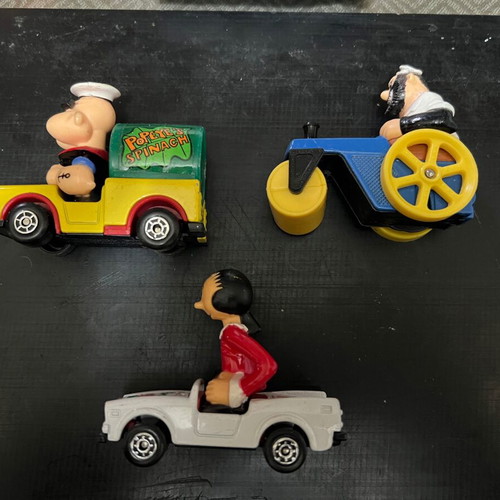 Comic figures in Matchbox Gorgi cars used, pack of 7