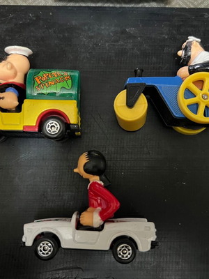 Comic figures in Matchbox Gorgi cars used, pack of 7