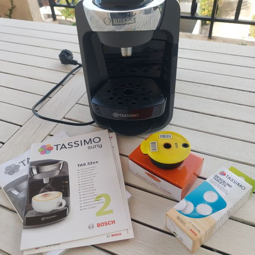 Bosh Tassimo Suny espresso machine used with reusable capsule and descaling tablets