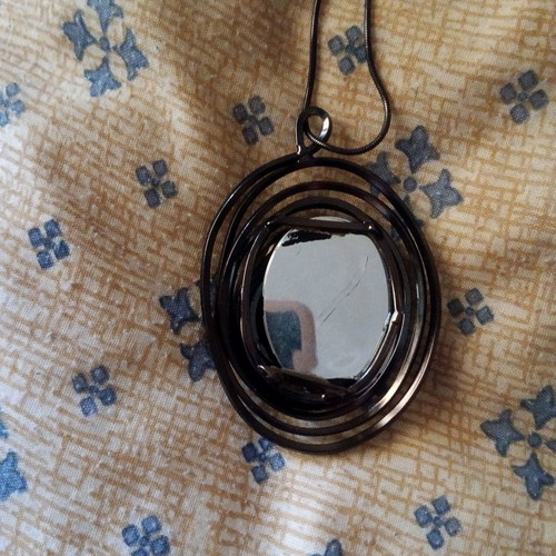 Pendant with long chain used, purple and mirror detail