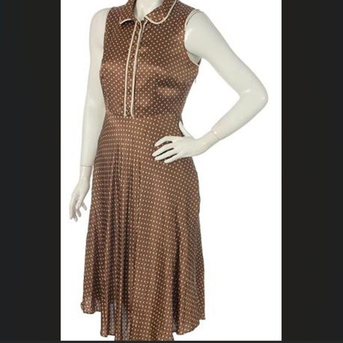 Brown sleeveless summer dress with polka dots