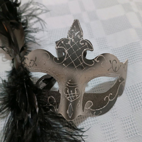 Venetian-style mask with feathers like new
